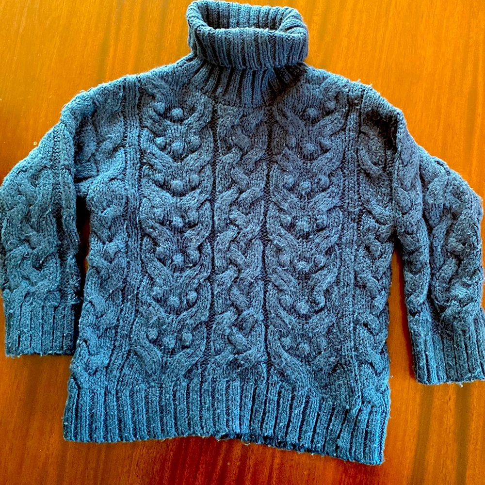 Blue cable knit sweater